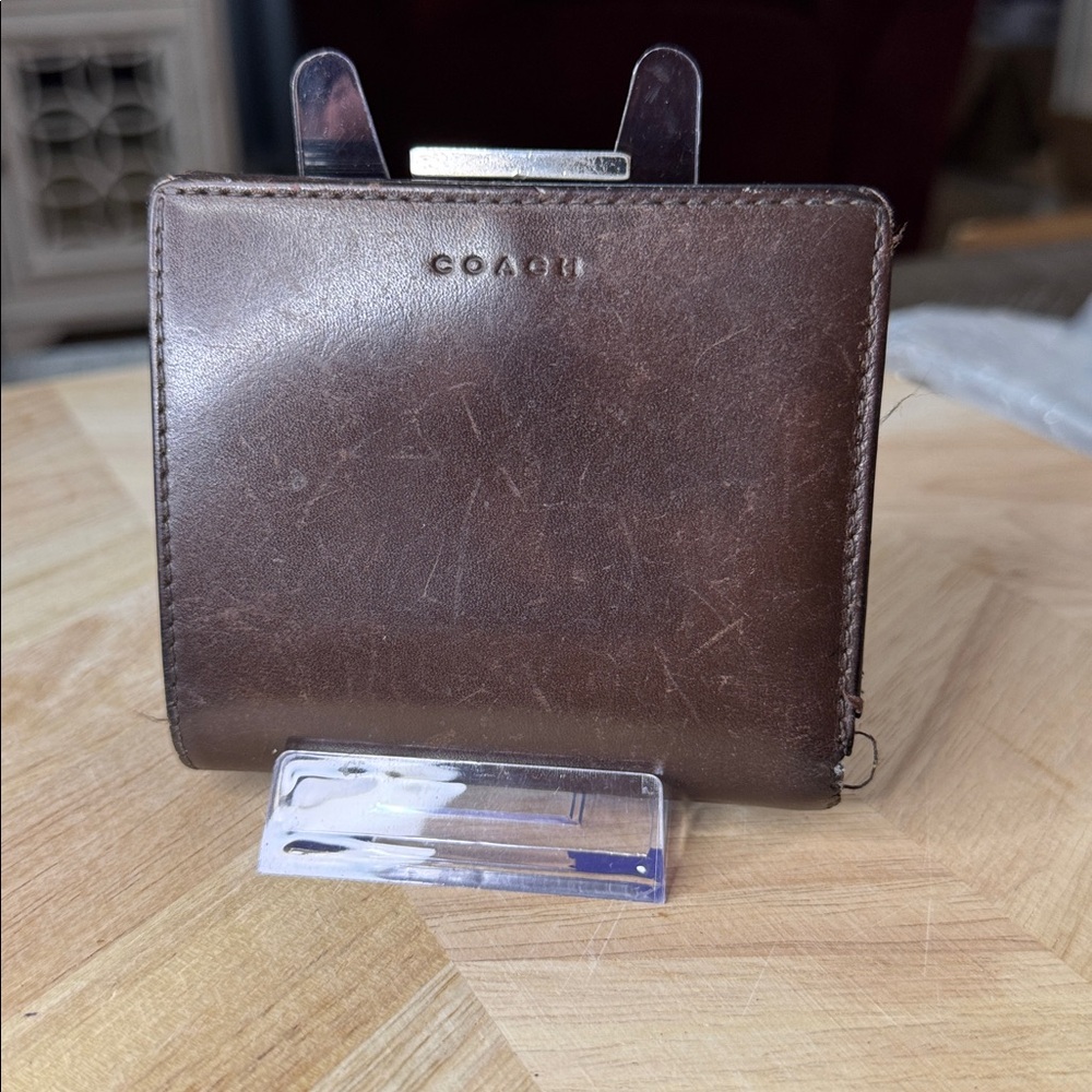 Coach vintage brown leather bifold snap wallet.